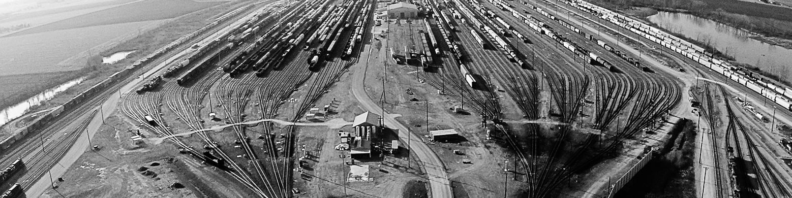 Train yard black and white image